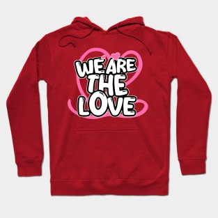 We Are The Love: Bold Contrast & Unity in Black, White, and Red Hoodie